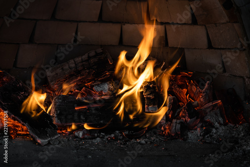 Wooden charcoal fire burning in a furnace, preparing for baking