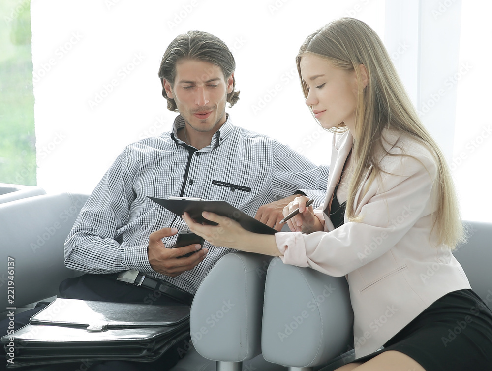 business team discussing documents in a work break business team discussing documents in a work break