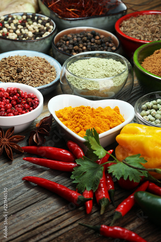 Spices and herbs on table. Food and cuisine ingredients. © beats_