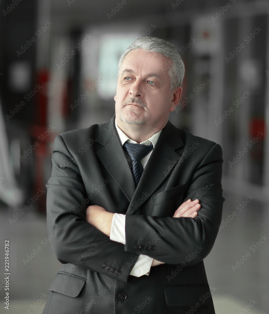 thoughtful businessman on background of office.photo with copy space