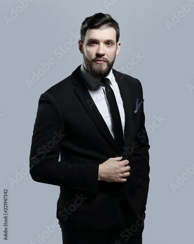 portrait of a confident businessman.isolated on grey background