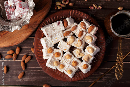 Turkish delight on a wooden table.