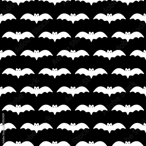 Black and white vector seamless pattern background with bats silhouettes for Halloween design.