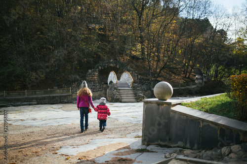 sisters walk in the park