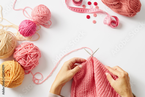 Slika na platnu Woman hands knitting with needles and yarn