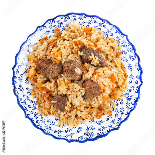 top view of cooked pilaf on local ceramic plate