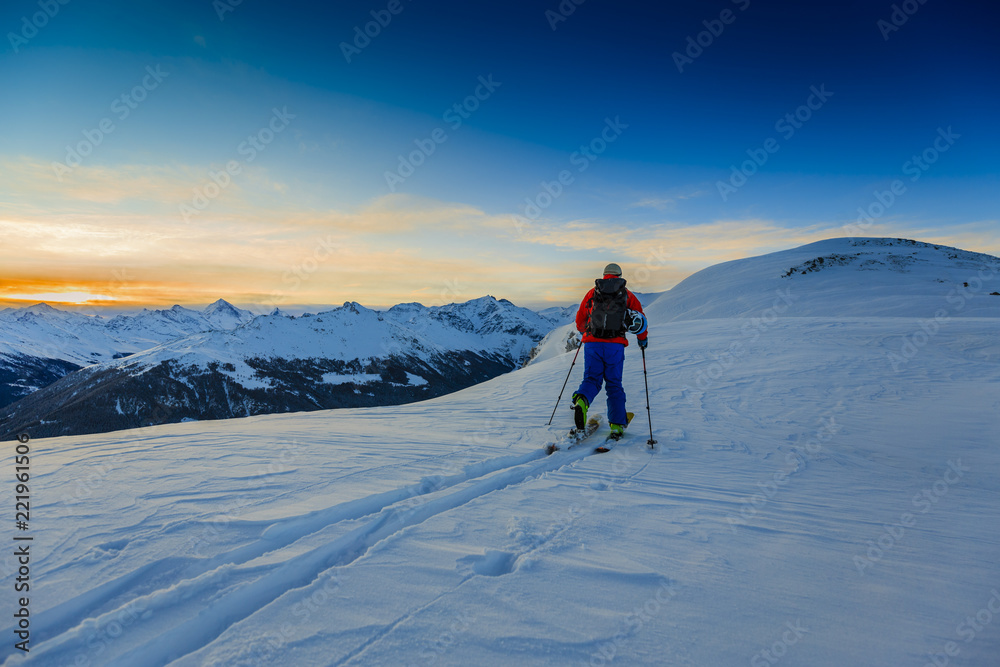 Ski with amazing view of swiss famous mountains in beautiful winter snow Mt Fort. The skituring, backcountry skiing in fresh powder snow.