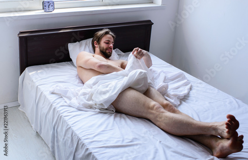 Why men get morning erections. Normal erections occur. Macho sexy guy torso relaxing lay bedroom. Morning wood formally known nocturnal penile tumescence common occurrence. Male reproductive system photo