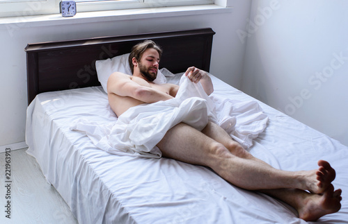 Why men get morning erections. Normal erections occur. Macho sexy guy torso relaxing lay bedroom. Morning wood formally known nocturnal penile tumescence common occurrence. Male reproductive system