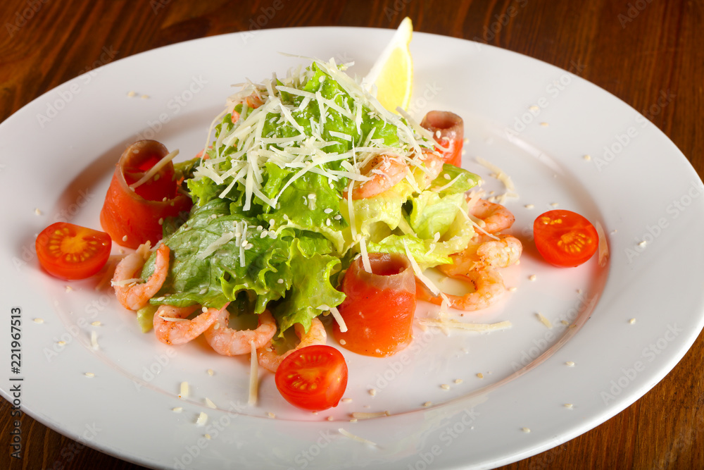 Caesar salad with shrimps and salmon Caesar salad with shrimps and salmon