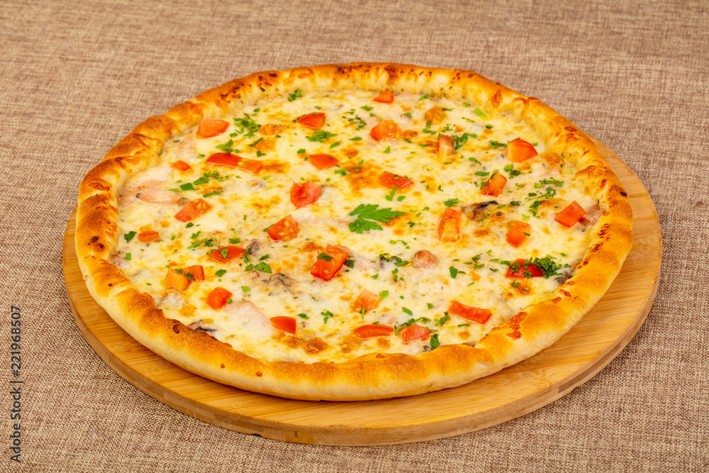 Seafood pizza with tomatoes