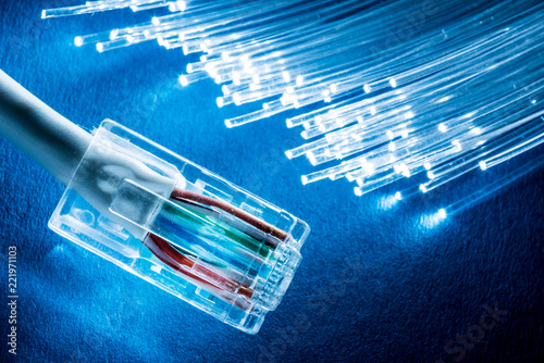 Photos Network cable and optical fibers with lights.