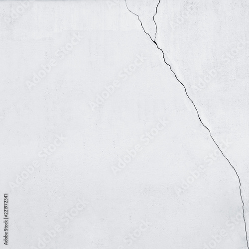 Part of cracked dirty white wall background.