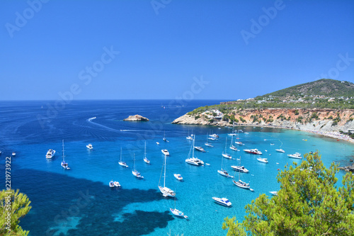 Cala d'Hort bay with beach on Ibiza island photo