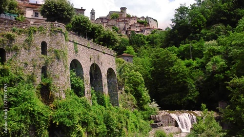 Castle of Bagnone view with waterfall, Tuscany, Italy photo