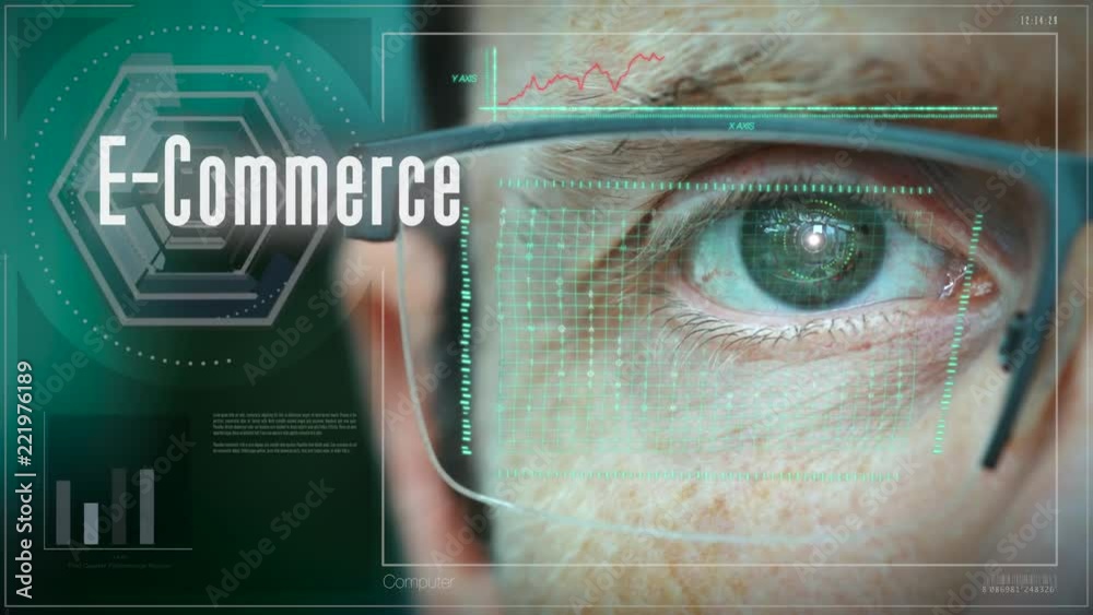 A close up of a businessman eye controlling a futuristic computer system with an E-Commerce concept.
