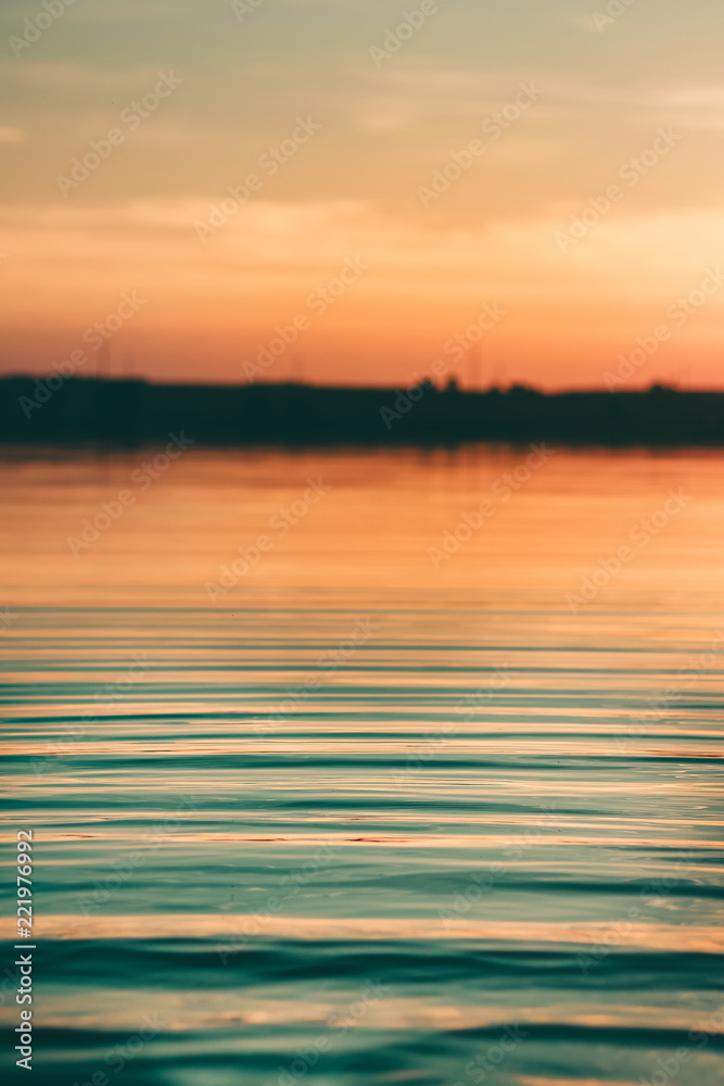 light waves on the water at sunset

