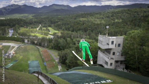 Foto Ski jump athlete jumping at a summer practice at Lake Placid, NY