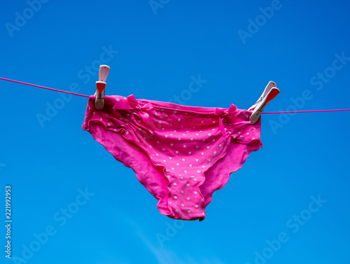 Pink pants, knickers on washing line