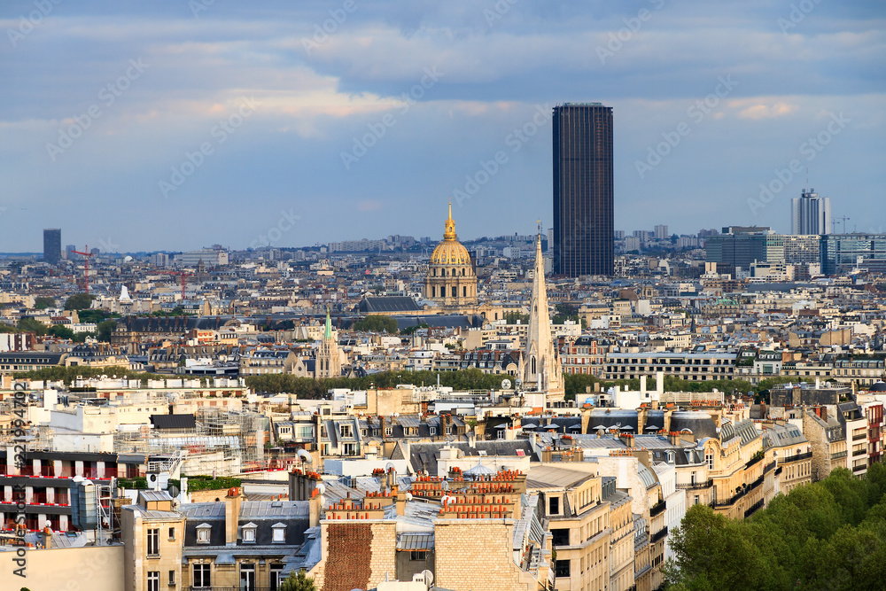 View of the Montparnasse skyscraper and Invalides seen from the Arc de Triomphe in the afternoon in Paris, France
