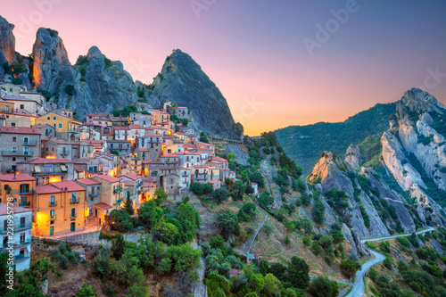 Castelmezzano, Italy. Cityscape aerial image of medieval city of Castelmazzano, Italy during beautiful sunrise.