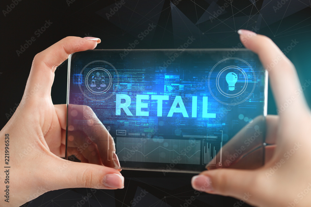 Obraz premium The concept of business, technology, the Internet and the network. A young entrepreneur working on a virtual screen of the future and sees the inscription: Retail