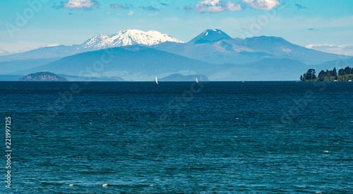 Fototapeta Naklejka Na Ścianę i Meble -  The landscape of great lake Taupo the largest freshwater lake in New Zealand with the volcanic landscape of Tongariro national park at the background.