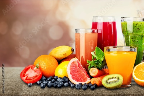Tasty fruits and juice with vitamins on
