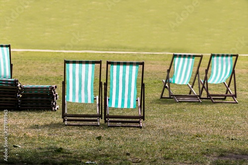 Deckchairs for hire in Hyde Park. Westminster. London. England. photo