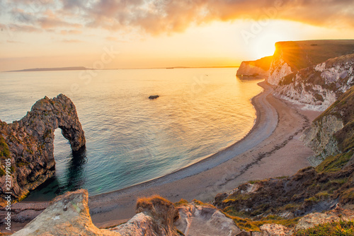 Εκτύπωση καμβά Landscape of empty Durdle Door beach at Sunset. Dorset England.