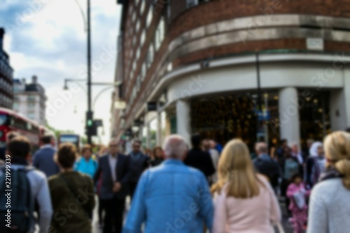 Blurred view of unidentified commuters and shoppers on Oxford Street, one of London's busiest streets. London, UK photo