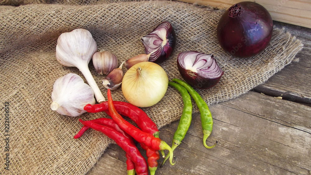 Spicy and healthy vegetables on wooden background.The harvest from the garden.