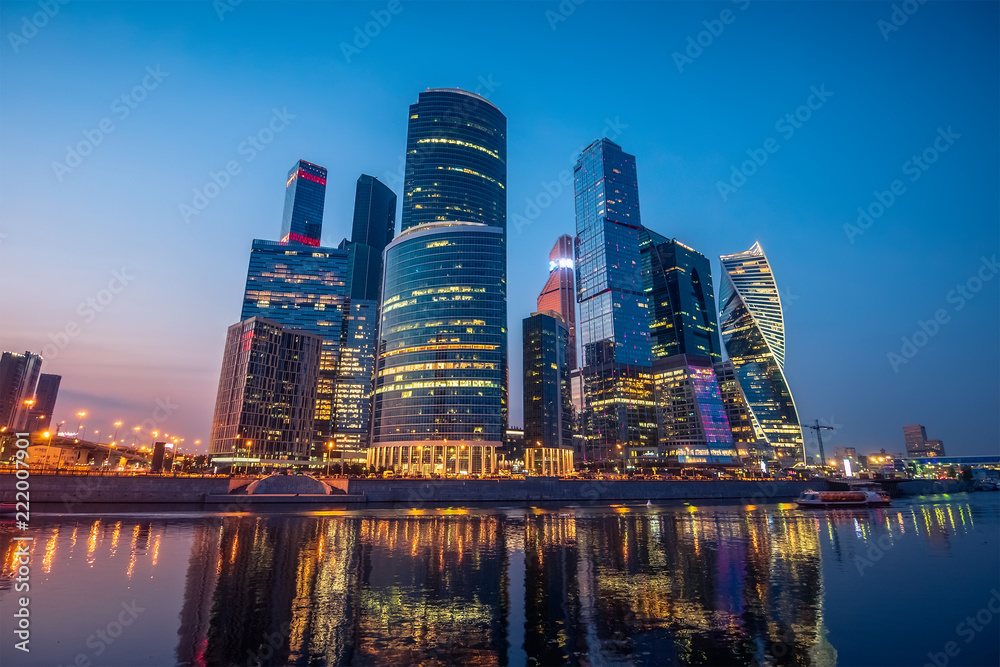 Panorama of Moscow City - new modern International business center with futuristic architecture skyscrapers buildings reflected in Moscow river