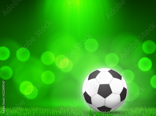 soccer ball on grass with green bokeh background