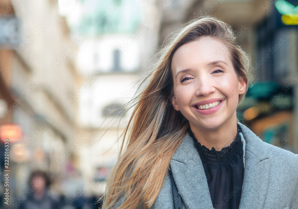 Close up of a smilie woman on the street