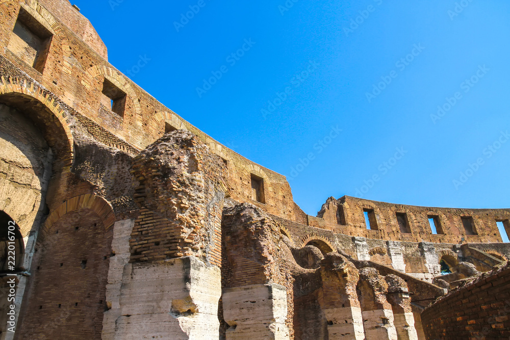 Inside view of the Colosseum in Rome, Italy on a sunny day.