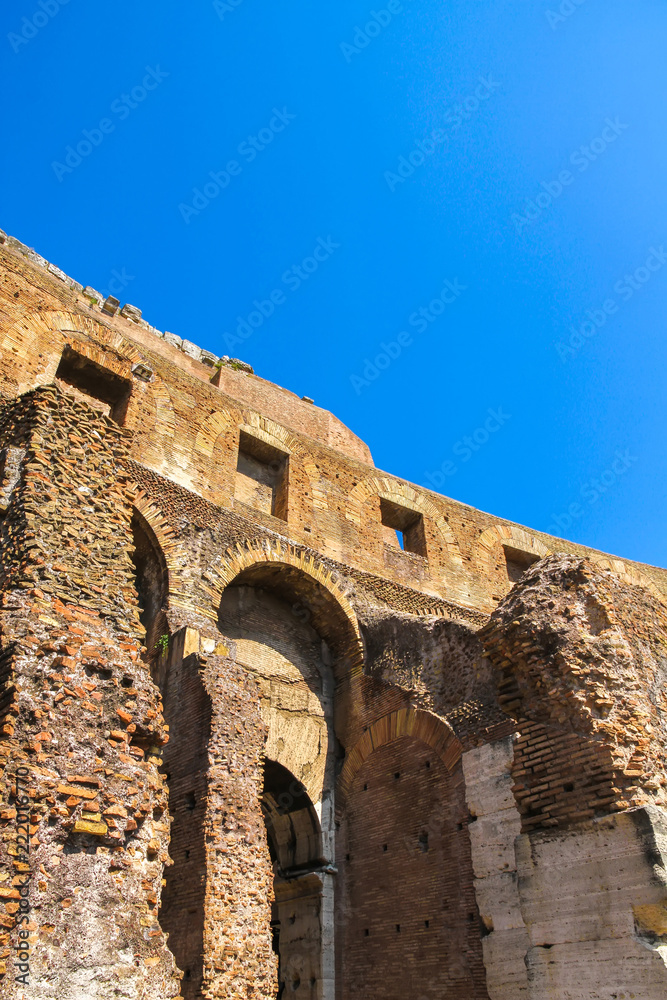 Inside view of the Colosseum in Rome, Italy on a sunny day.
