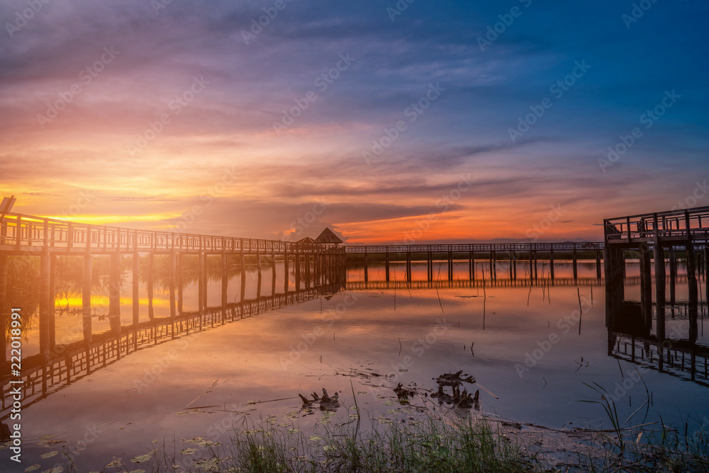 Wooden bridge at sunset in Khao Sam Roi Yod National Park, Prachupkhirikhan Province, Thailand.