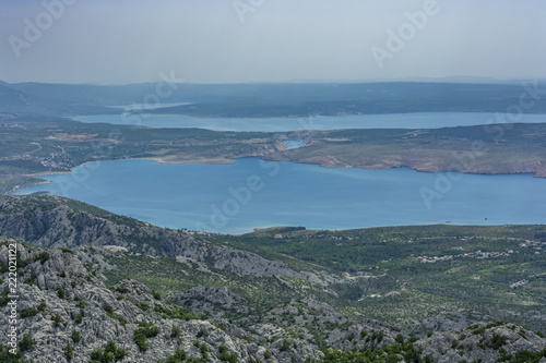 Landscape rocky mountains national park "Paklenica" in Croatia. Dark blue sea from high hills.