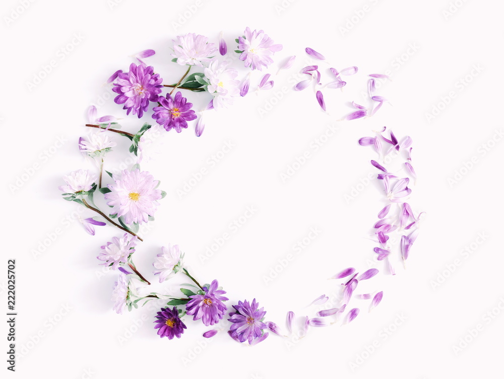 Floral composition. Frame made of fresh flowers on white background. Flat lay, top view, copy space 