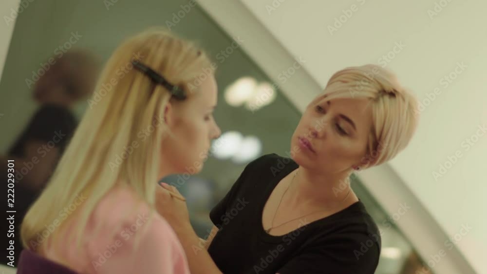 Beautiful young girl in a beauty salon