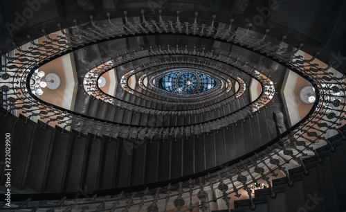 Spiral staircase with chandeliers