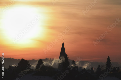 Village silhouette and colorful sunrise © YesPhotographers