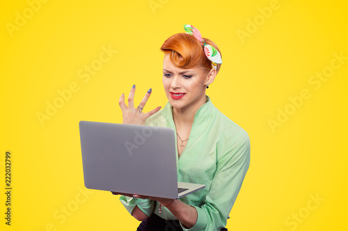 Stressed frustrated pinup girl woman with computer