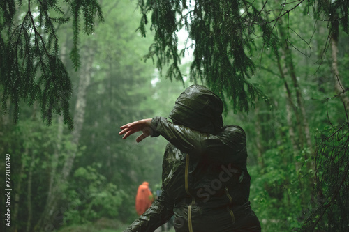 Tourists in the rainy forest