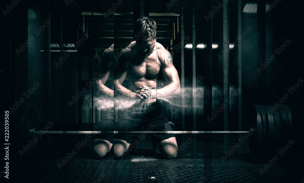 Fototapeta Muscular man clapping hands and preparing for workout