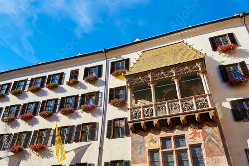 INNSBRUCK, AUSTRIA -29.08.2018: Goldenes dachl (Golden roof) in Innsbruck in a beautiful summer day. Historical center of Innsbruck town in Tyrol, Austrian Alps, Austria in Summer. photo