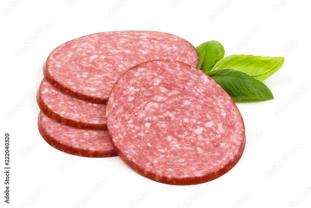 Dry salami sausage slices with basil leaves, isolated on white background. Dry salami sausage slices with basil leaves, isolated on white background.