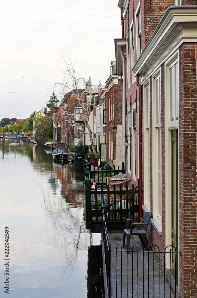 Canal in Leiden. Beautiful old hauses with balconies overlooking the canal. World water day.