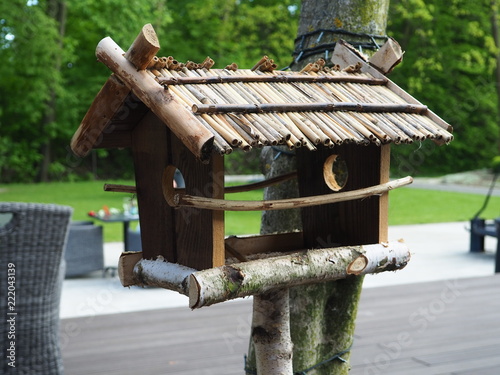 Birdhouse, bird feeder on the tree